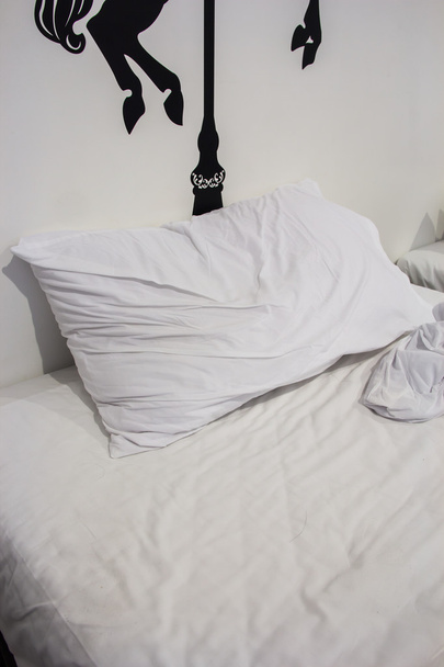 White bedroom with pillows. - Zdjęcie, obraz