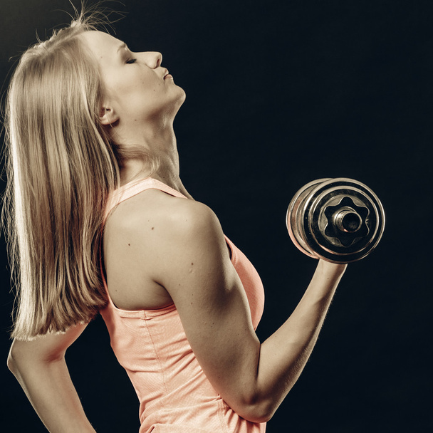 Fitness sporty girl lifting weights - Zdjęcie, obraz