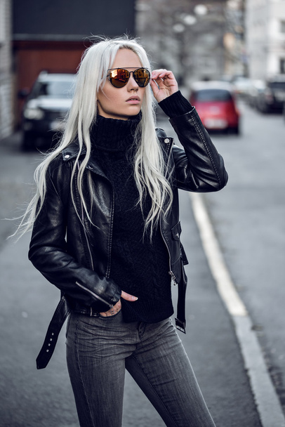 Portrait of beautiful blonde girl in sunglasses outdside - Photo, image