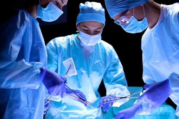 Team surgeon at work in operating room. - Φωτογραφία, εικόνα