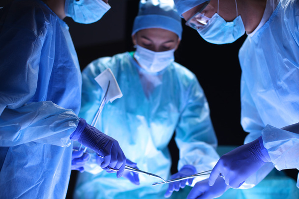 Team surgeon at work in operating room. - Fotografie, Obrázek