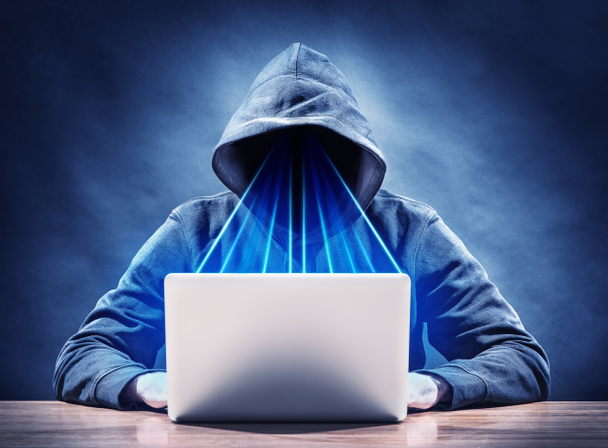 hacker on a laptop - Foto, afbeelding