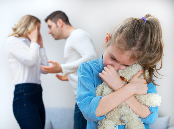 Parents quarreling at home, child is suffering. - Fotografie, Obrázek