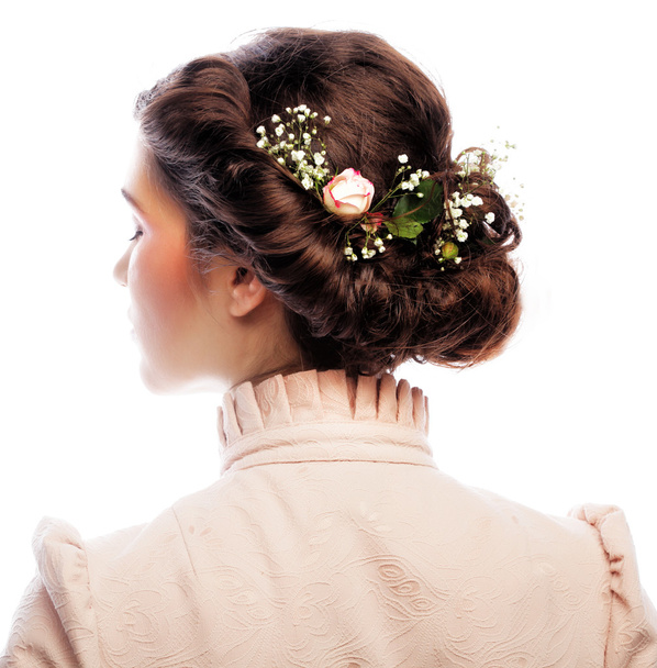 back view of beautiful haircut with small flowers - Foto, Bild