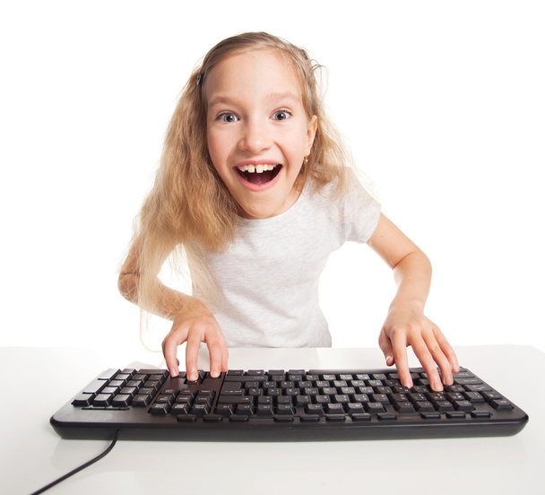 Child looking at a computer - Fotó, kép