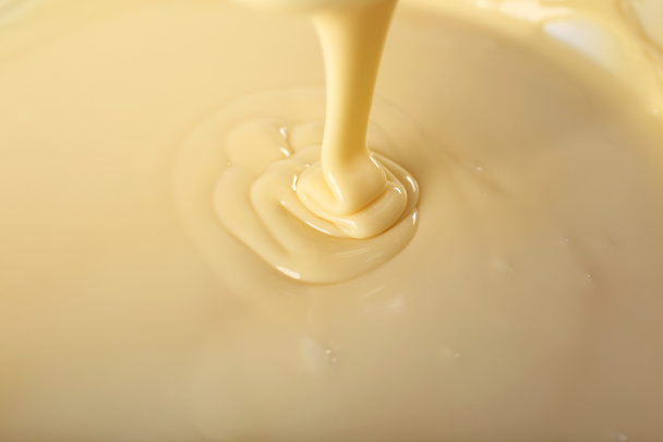 Background of condensed milk in a bowl - Foto, Imagem