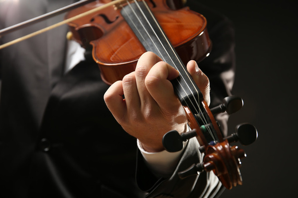Musician plays violin  - Foto, Imagen