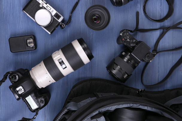 Photographer's equipment on floor  - Foto, afbeelding