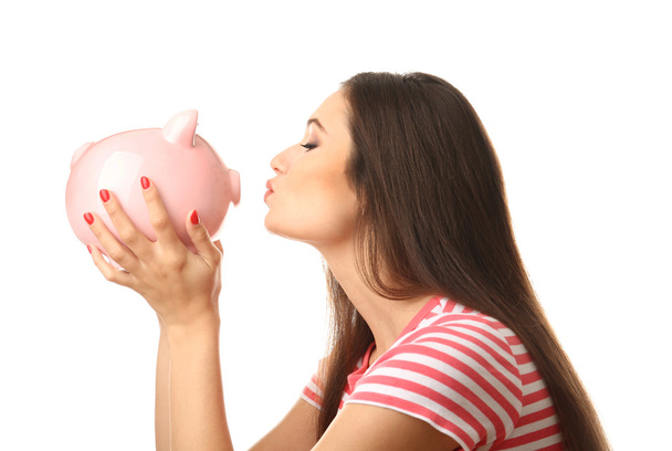 Woman with pig money box  - Foto, Bild