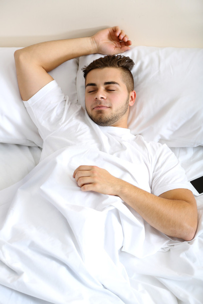 young man snoozing - Foto, imagen