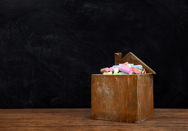 Wooden box of coloured chalk - Foto, afbeelding