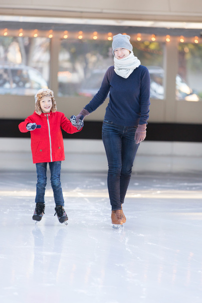 family ice skating - 写真・画像