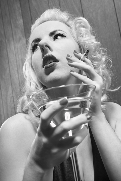 Woman with martini. - Zdjęcie, obraz