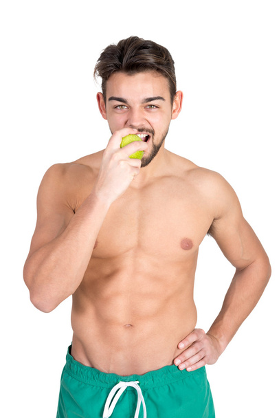 fitness man with apple - 写真・画像