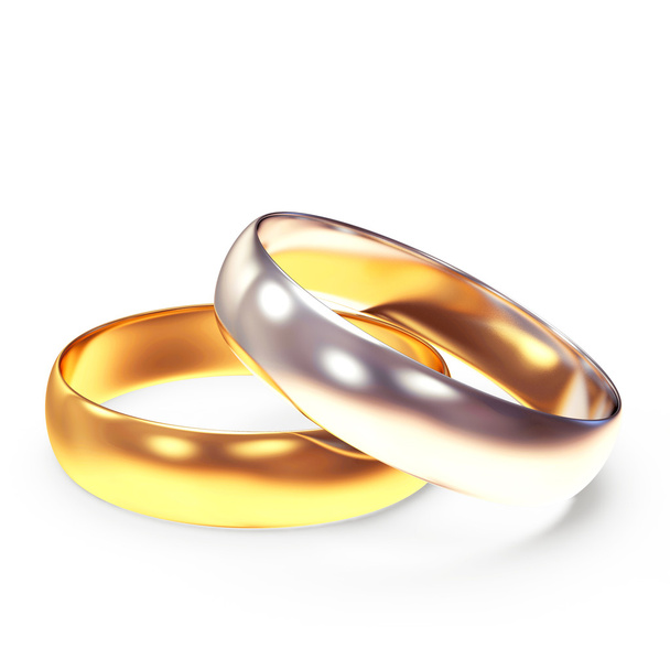 par de brillantes anillos de boda dorados
 - Foto, imagen