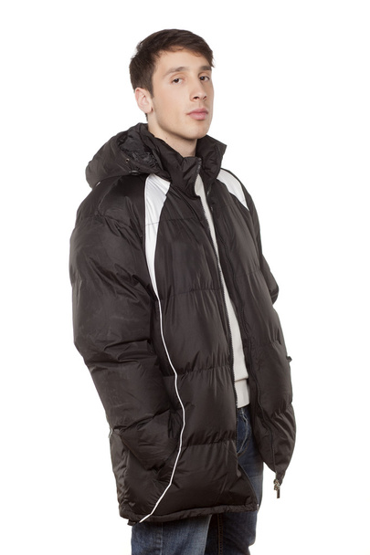 young man in winter jacket - Foto, Bild