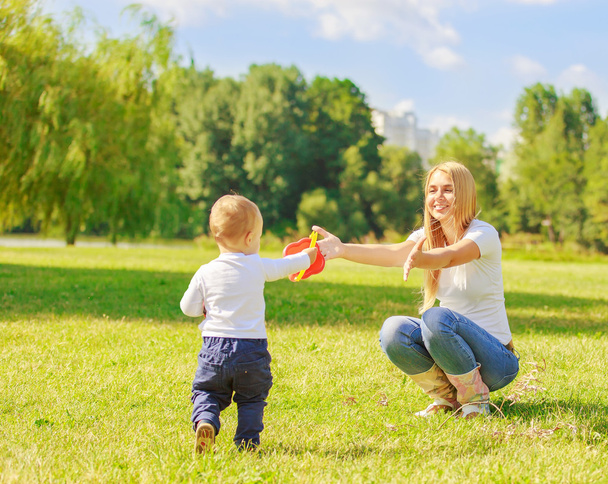 happy mother and son on a walk on a Sunny day - Фото, изображение