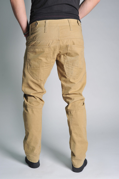 Молодежные джинсы надели на парня
 - Фото, изображение