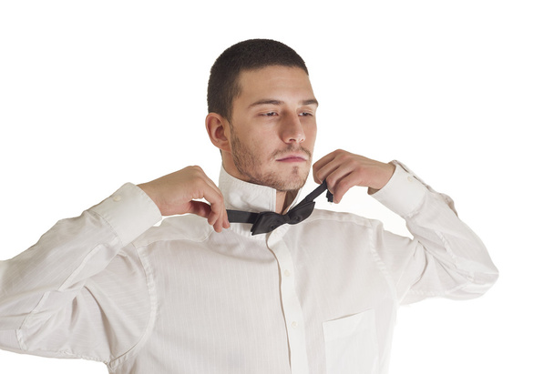  Young man with a bow tie in different outwear - Photo, Image