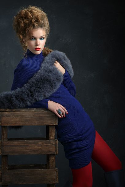 Portrait young elegant woman in blue dress and fur collar - Photo, Image