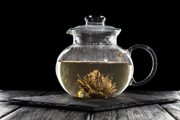 Glass teapot on black - Valokuva, kuva