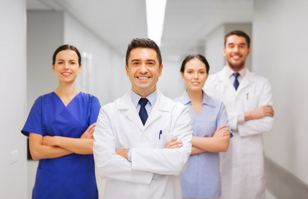 happy group of medics or doctors at hospital - Фото, зображення