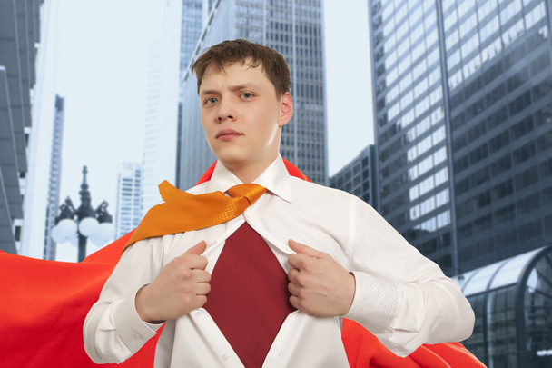 Businessman showing the superhero suit - Photo, Image