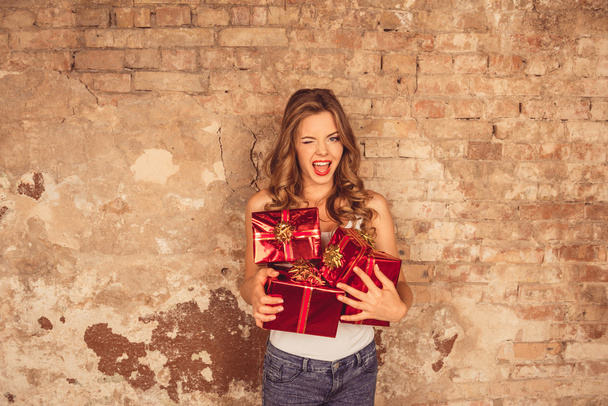 Beautiful girl with presents - Фото, изображение