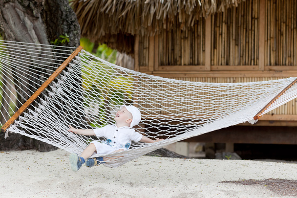 Adorable toddler in a hammock - Foto, imagen