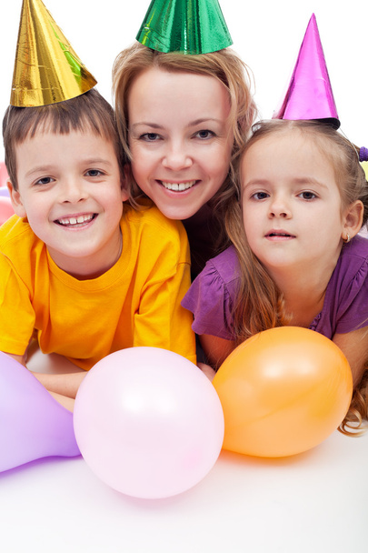 Party with hats and balloons - 写真・画像