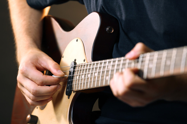 musician playing acoustic guitar  - Фото, зображення