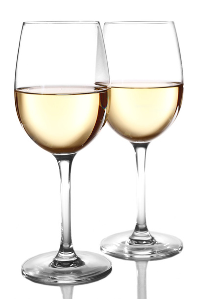 Two  glasses of wine on light background - Photo, image