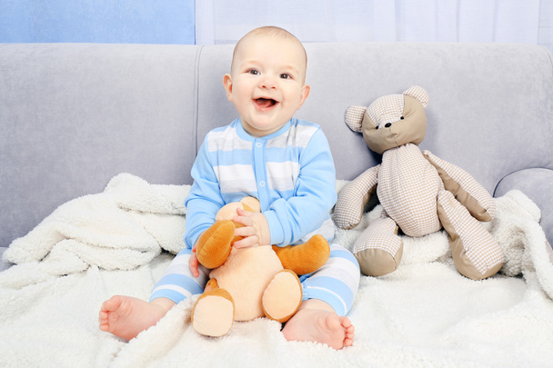 Adorable baby with teddy bears - Фото, изображение