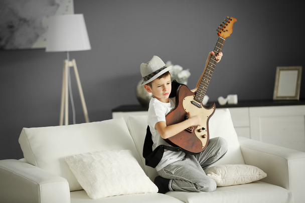 boy playing guitar  - 写真・画像