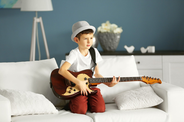 boy playing guitar  - Valokuva, kuva
