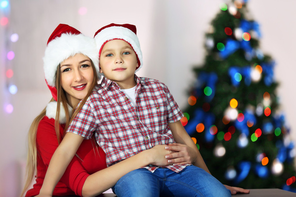 girl and boy in Christmas room - Photo, Image