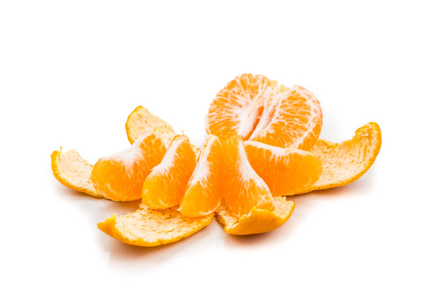 Peeled sweet and juicy mandarin oranges on white background - Фото, изображение
