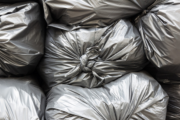 Close up pile of black garbage bags  - Photo, Image