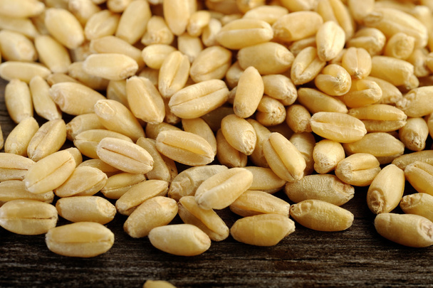 raw pearl barley on wooden background - Photo, Image