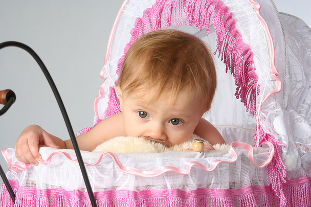 baby girl toddler close up portrait in pram - Valokuva, kuva