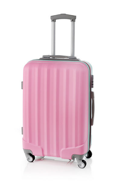 Pink suitcase on white - Фото, изображение