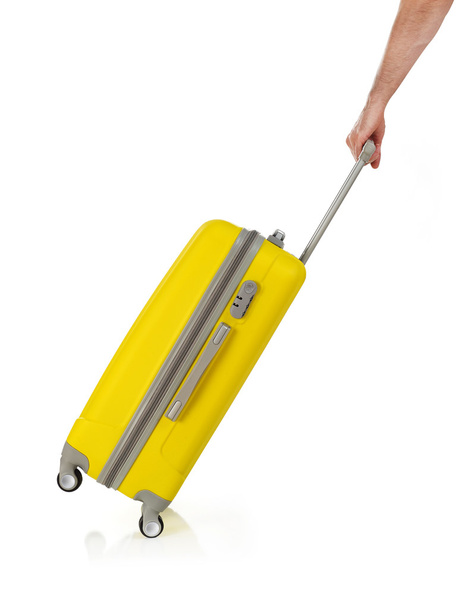 Carrying a suitcase - Foto, imagen