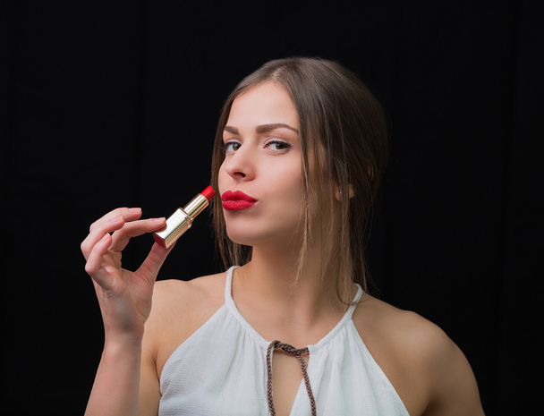 Nainen punaisen huulipunan kanssa
 - Valokuva, kuva