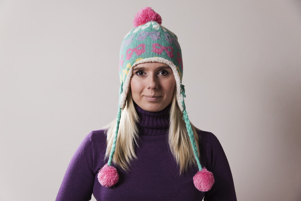 woman wearing a colorful winter cap - Photo, Image