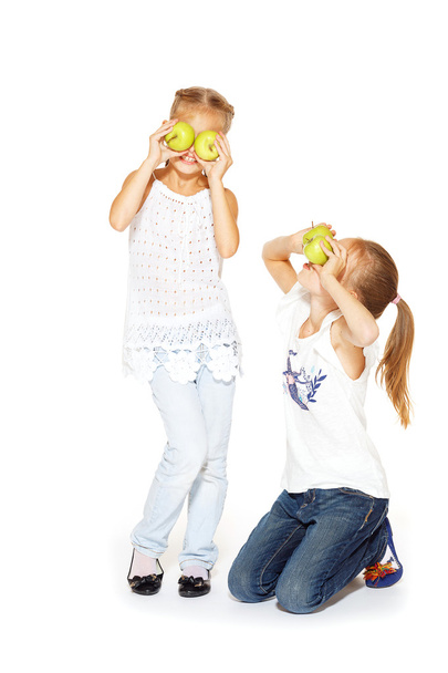Beauty young girls with fresh apples - 写真・画像