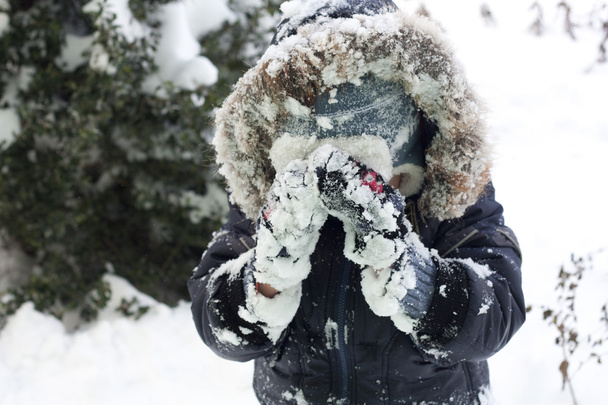Child Playing With Snow - Фото, зображення