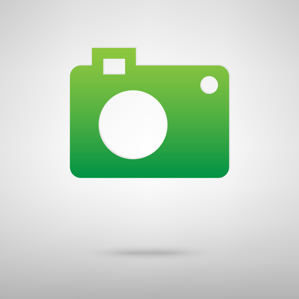 Камера. Зеленая иконка с тенью
 - Вектор,изображение