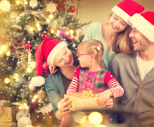 Happy family celebrating Christmas - Foto, imagen