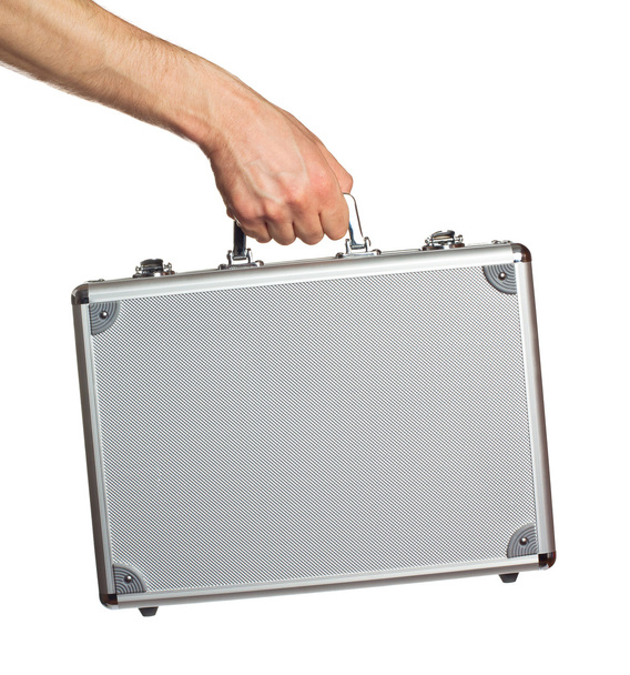Silver metal briefcase in hand - Fotoğraf, Görsel