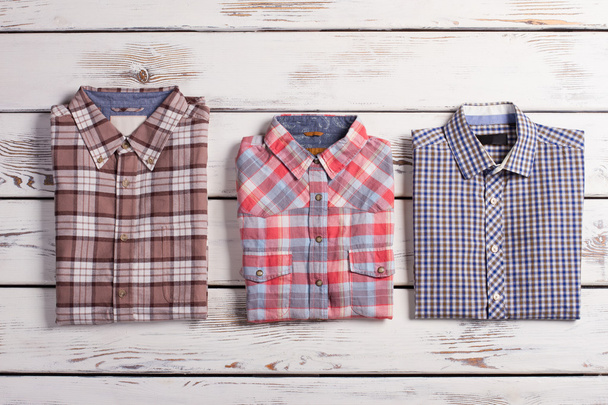 Three stylish men's checkered shirts. - Foto, Imagem